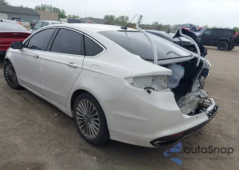 2016 Ford Fusion Titanium z USA, uszkodzony, nr VIN 3FA6P0K96GR103571
